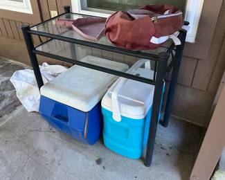 Patio room - glass top table & ice chests