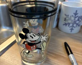Set of (9) vintage Mickey Mouse glasses in kitchen