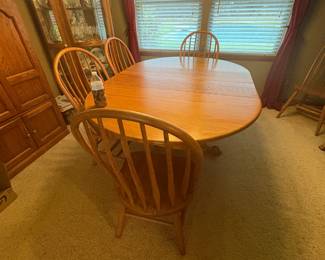 . . . Amish-style oak table and chairs