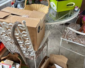 . . . wrought-iron table and chairs