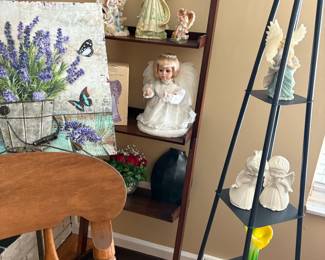 . . . nice shelving unit and angels/art glass