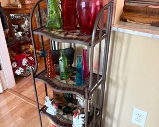 . . . nice shelving unit filled with art glass