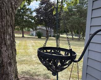. . . wrought-iron hanging basket