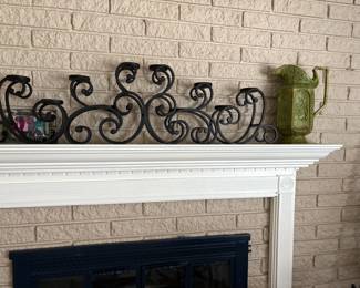 . . .  wrought-iron accent and pitcher