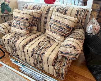 . . .  upholstered loveseat