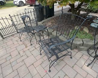 . . . more wrought-iron chairs