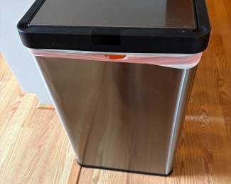 . . . stainless waste basket