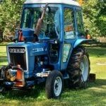 The Ford tractor in the front yard (runs)