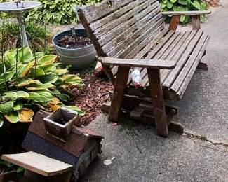 Great bench outside of the garage