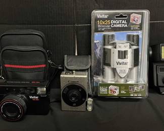 CT556Vintage Vivid And Canon Cameras