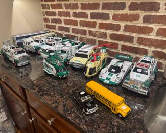 Large Collection of Hess Toy Trucks, Planes, Helicopters and Race Cars