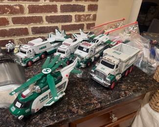 Large Collection of Hess Toy Trucks, Planes, Helicopters and Race Cars