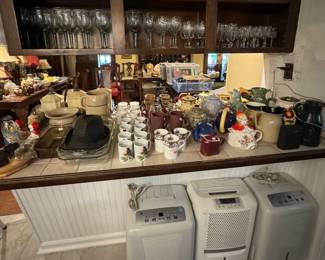 Various Make of Stemware including Waterford and Minon Faget   /  Dehumidifiers / Bakeware / Decorative Kitchen Pieces:  Teapots, Pitchers, Vases,  Little Red Riding Hood Cookie Jar, Teapot and Salt & Pepper Shakers.