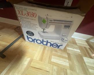 HAVE THIS SEWING MACHINE  W/ BOX 