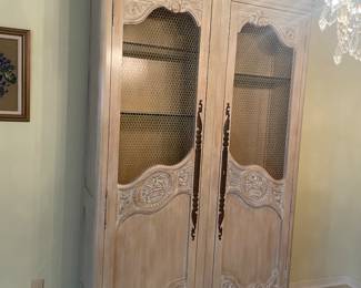 HAVE 2 LARGE SOLID WOOD ARMORIES W/ GLASS SHELVES LIKE THIS ONE