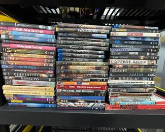 $50 - Lot of 65 DVDs - Indiana Jones, Twilight Zone, Pirates of the Caribbean, Harry Potter, National Treasure, et al