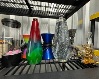 $30 - Lot of Assorted Decor - One Fountain Lamp w/ Jellyfish, Two Lava Lamps(One Large), Pewter Harry Potter Goblet Tower, Small Lamp