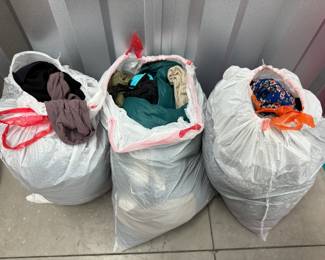 $60 , 3 trashbags full of womens clothing size L-XL in great shape , some brand new 