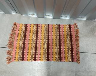 $15 Small Woven rug in good condition