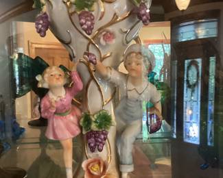 Porcelain Vase with girl in pink and boy