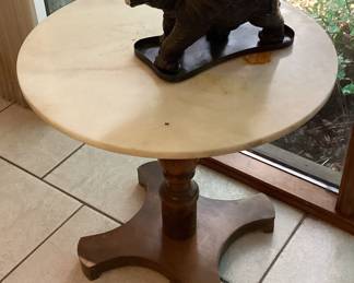 Small round table with dark wood base