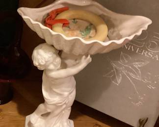 Porcelain Girl holding square dish
