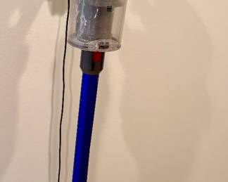 Dyson wall mount with 4 million extra pieces and parts! Like New condition