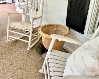 White porch rockers, wicker planter