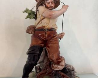 Porcelain Figurine of a Hunter with Dog 