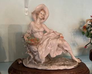 Giuseppe Armani Capodimonte porcelain figurine - woman holding a basket of fruit 