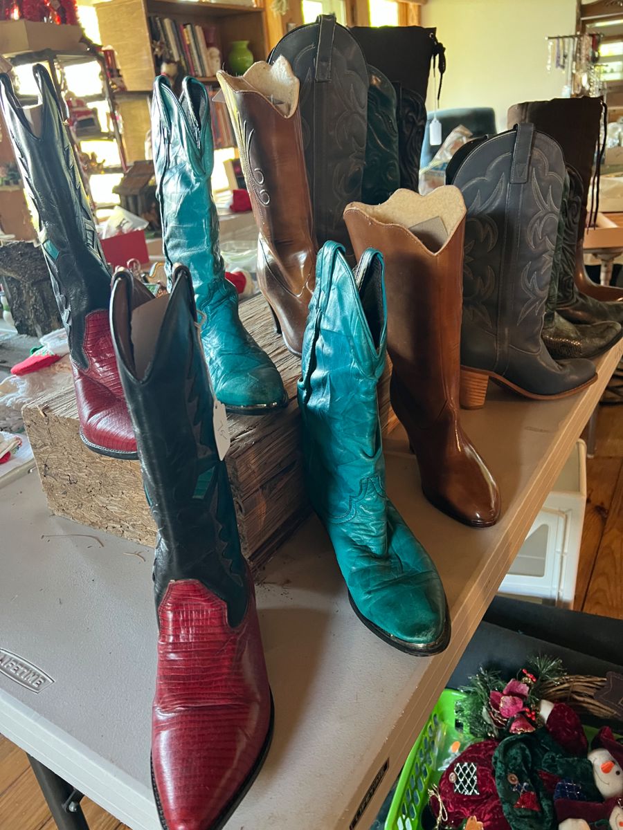 Cowboy Boots Collection – Estate Sale Find!
A fantastic selection of vintage and classic Western boots in various colors and styles! This collection includes:
Bold red leather boots with black accents – eye-catching and stylish.
Striking turquoise boots with traditional stitching – a standout pair!
Classic brown leather boots with a stacked heel – timeless and versatile.
Elegant black boots with detailed stitching – perfect for everyday wear or special occasions.
These boots are not only fashionable but also collectible pieces for any Western wear enthusiast. Sizes vary – come try them on and take home a pair (or two!) of authentic cowboy style.