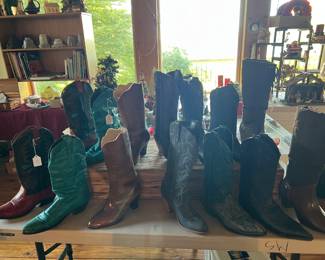 A fantastic selection of vintage and classic Western boots in various colors and styles! This collection includes:
Bold red leather boots with black accents – eye-catching and stylish.
Striking turquoise boots with traditional stitching – a standout pair!
Elegant black boots with detailed stitching – perfect for everyday wear or special occasions.