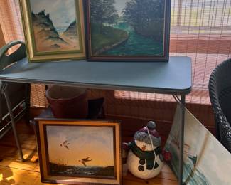 A lovely assortment of framed original artwork and décor pieces, perfect for collectors and home decorators alike.
Landscape Paintings – Includes a serene beach scene with sand dunes and seagulls, a tranquil river lined with trees, and a striking coastal sunset with birds in flight. Each piece is framed and ready for display.
Nautical Art – A large painting featuring a fishing boat on the open water, ideal for lake or coastal home décor.
Seasonal Décor – A charming snowman figure with a knit hat, scarf, and button details, great for holiday decorating.
This collection blends natural beauty, nautical charm, and seasonal warmth—wonderful finds for art lovers and those seeking unique home accents.