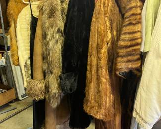 Stunning selection of vintage fur and faux fur coats, perfect for collectors, fashion enthusiasts, or anyone looking to add a bold statement piece to their wardrobe. Collection includes:
Classic shearling coats with fur trim cuffs and collars
Rich black fur coat with a luxurious feel
Warm golden brown and striped fur coats with timeless style
Assorted lengths and sizes
These coats are elegant, stylish, and ideal for cold-weather wear or vintage fashion resale. Don’t miss the chance to own a piece of retro luxury!