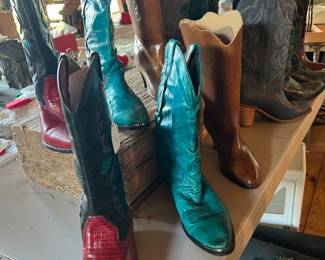 Cowboy Boots Collection – Estate Sale Find!
A fantastic selection of vintage and classic Western boots in various colors and styles! This collection includes:
Bold red leather boots with black accents – eye-catching and stylish.
Striking turquoise boots with traditional stitching – a standout pair!
Classic brown leather boots with a stacked heel – timeless and versatile.
Elegant black boots with detailed stitching – perfect for everyday wear or special occasions.
These boots are not only fashionable but also collectible pieces for any Western wear enthusiast. Sizes vary – come try them on and take home a pair (or two!) of authentic cowboy style.