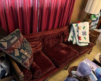 Couch, pillows, quilt