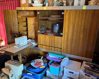 Complete sewing station with Bernina machine. Sewing supplies, sewing machines, fabric.