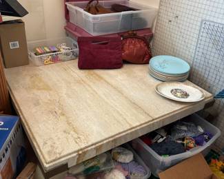 Marble coffee table, yarn