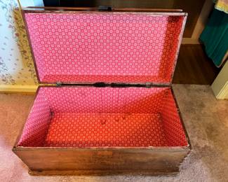 Antique dovetail trunk on casters