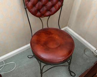 Late 1800’s tufted leather metal vanity chair