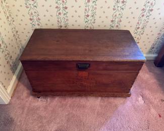 Antique dovetail trunk on casters