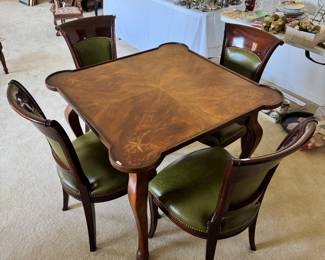 Inlay walnut game table with four green leather chairs
