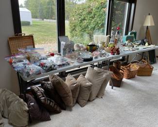 Nice pillows, sewing supplies, Longabarger baskets, picinic baskets