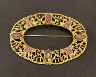 1928 jewelry Co Large Oval Brooch. Gold with Amethyst Marquise