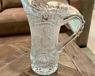 Vintage Pressed Glass Pitcher – Ornate Design - $30
Elegant pressed glass pitcher with scalloped rim and embossed floral/scroll motifs. Perfect for display, serving, or as a statement piece in your vintage kitchen décor. Excellent condition with no chips or cracks.