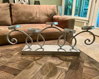 Scroll Metal Candle Holder - $12
Elegant silver-tone scroll metal candle holder with five platforms for pillar or votive candles. Sturdy rectangular base with graceful swirl accents makes it a perfect centerpiece for a dining table, mantel, or sideboard.

Dimensions (approx.): 18” wide × 9” tall × 5” deep
Condition: Excellent