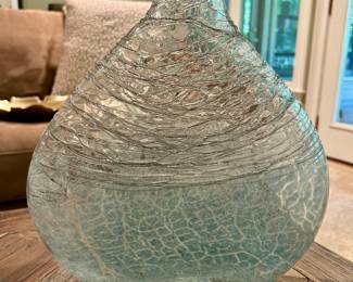 Decorative Crackle Glass Vase - $12
Attractive decorative vase with a crackle glass design and textured swirl pattern around the upper body. Subtle aqua/seafoam tint gives it a coastal, airy look.

Dimensions (approx.): 11” tall × 9” wide
Condition: Excellent