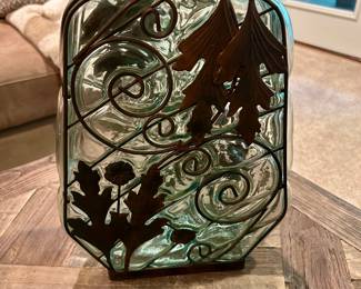 Glass & Metal Floral Vase - $45
Beautifully detailed heavy glass vase with ornate metal overlay featuring floral and vine motifs. Sturdy square base with a rustic finish.
Dimensions: Approx. 13” tall x 8” wide
Condition: Excellent – no cracks or chips