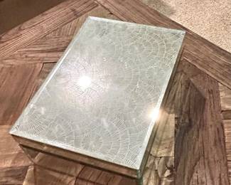 Mirrored Decorative Box with Textured Lid - $12
Elegant mirrored storage box with a silver textured lid design and soft black velvet interior. Perfect as a jewelry box, keepsake holder, or chic accent piece for a coffee table or vanity.