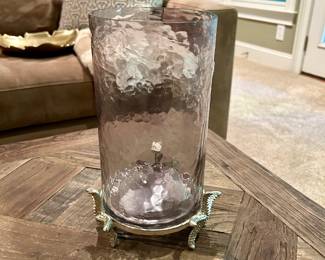 Hammered Glass Hurricane Candle Holder with Metal Stand - $8
Elegant hammered glass hurricane candle holder with a subtle lavender tint. Rests in a decorative silver-toned metal base with textured seahorse-style feet. Great for pillar candles or as a stylish accent piece.

Dimensions (approx.): 9” tall × 5” wide
Condition: Excellent